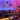 Sofa, table, and wall decorated with led strip lights.