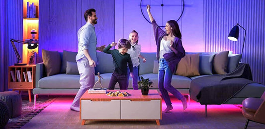 A family of four danced happily in a living room decorated with acoshneon led lights